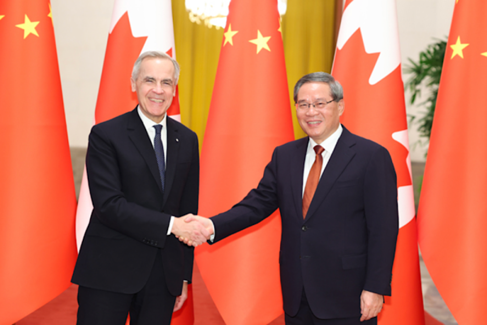 &Ccedil;in ve Kanada Başbakanları bir araya geldi